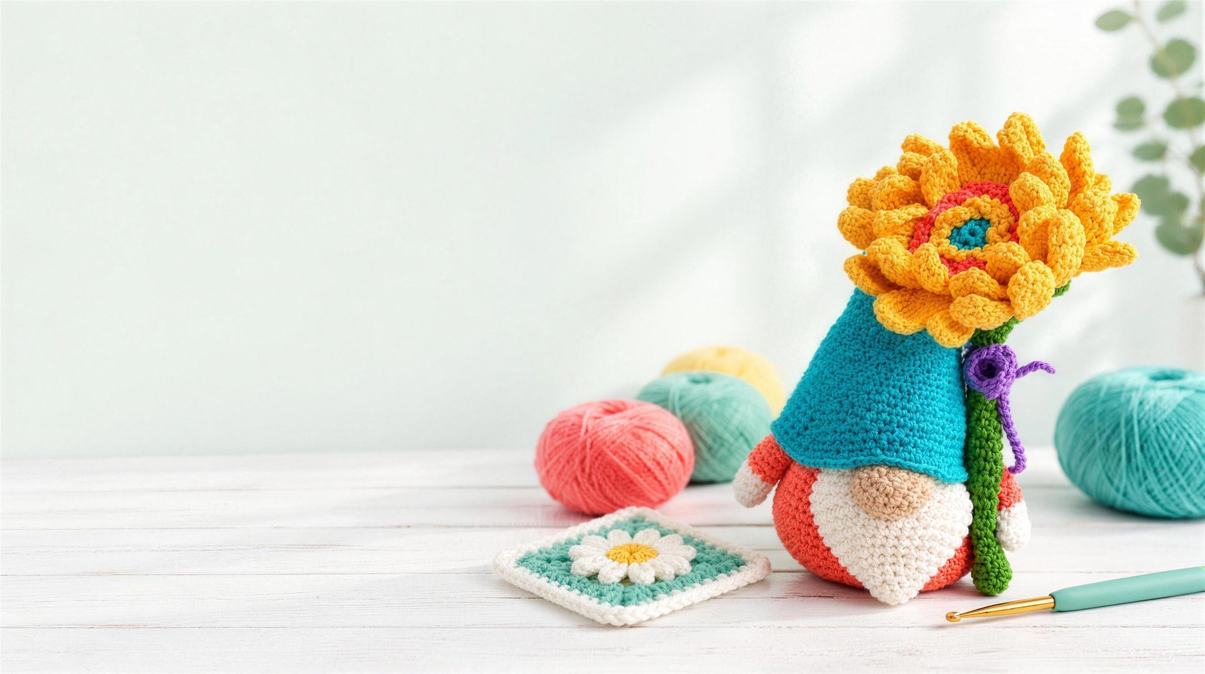 Golden Bloom crochet gnome with yarn balls and a daisy granny square